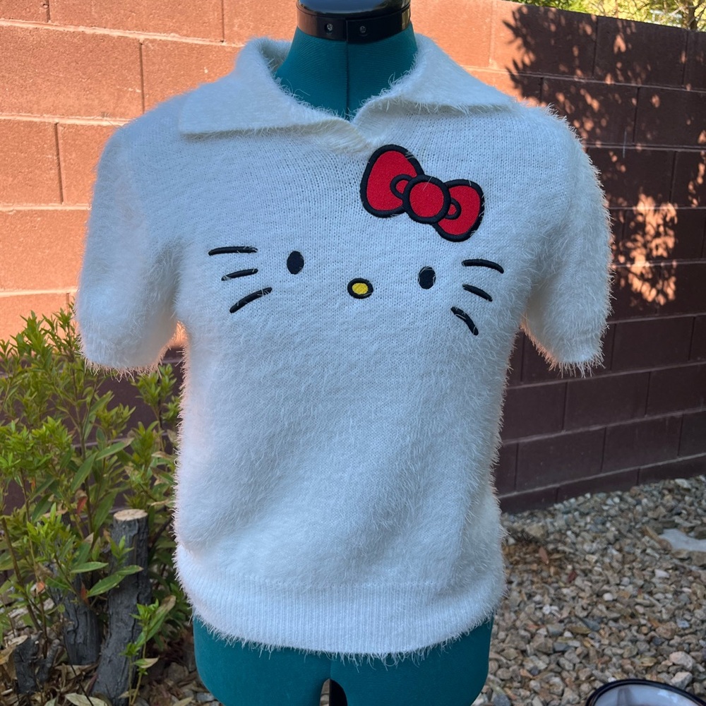 Cozy White eyelash Hello Kitty Sweater, worn one time.